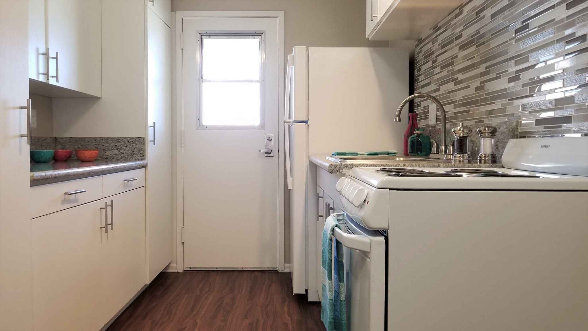 Cypress Senior Apartments renovated kitchen with mosaic backsplash