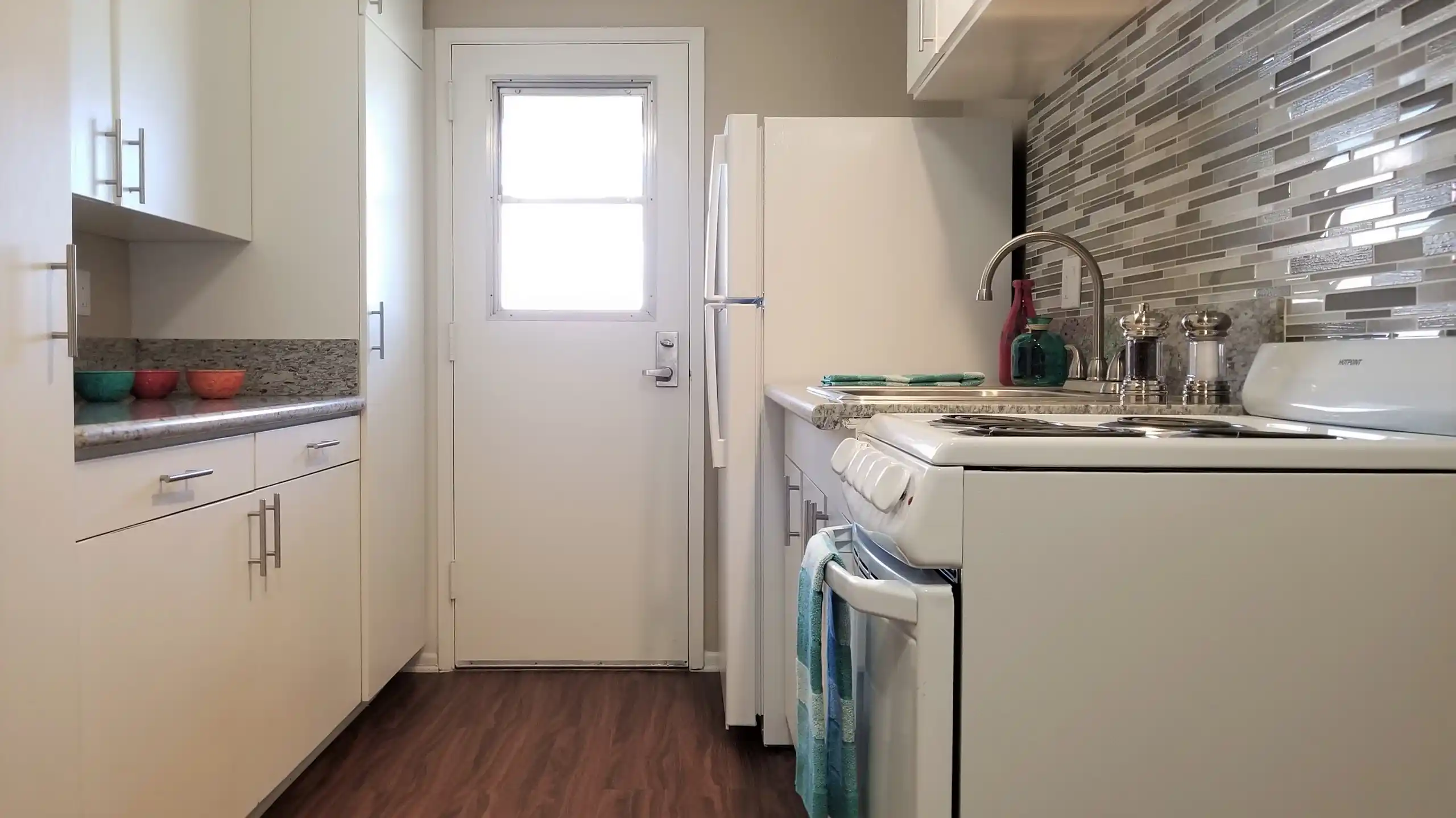 Cypress Senior Apartments renovated kitchen with mosaic backsplash