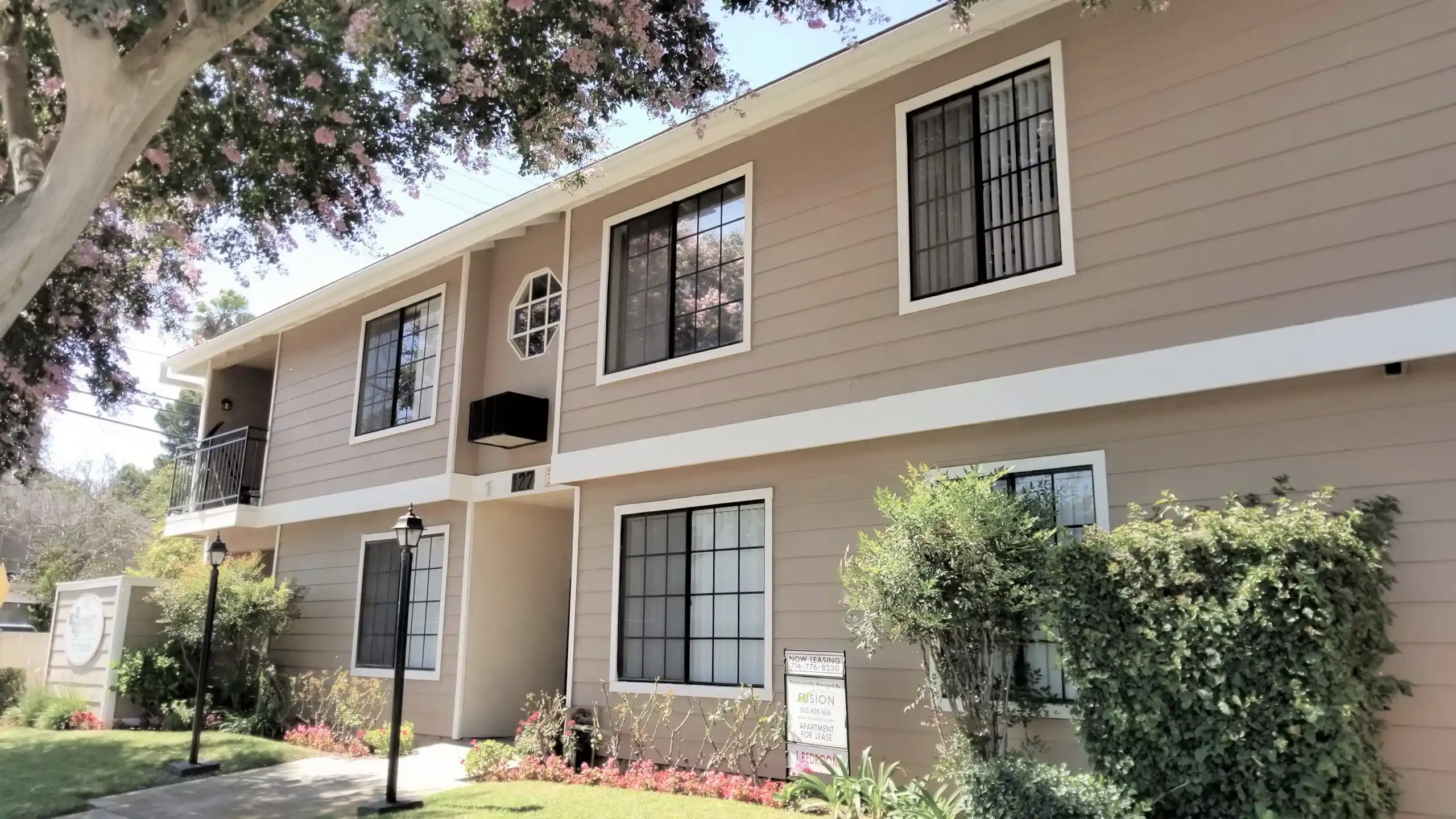 Cypress Senior Apartments two-story building exterior with landscaping