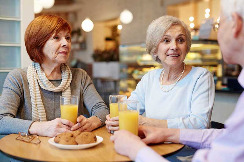 Group of seniors at a cafe